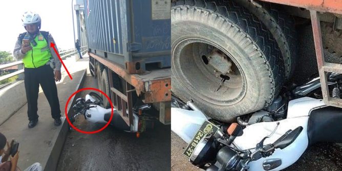 aksi-heroik-polisi-korbankan-motornya-untuk-tahan-truk-rem-blong